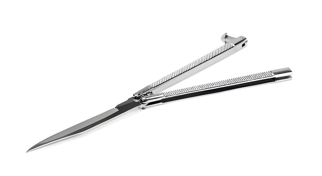 Silver butterfly knives with perforated handles placed on a wooden surface